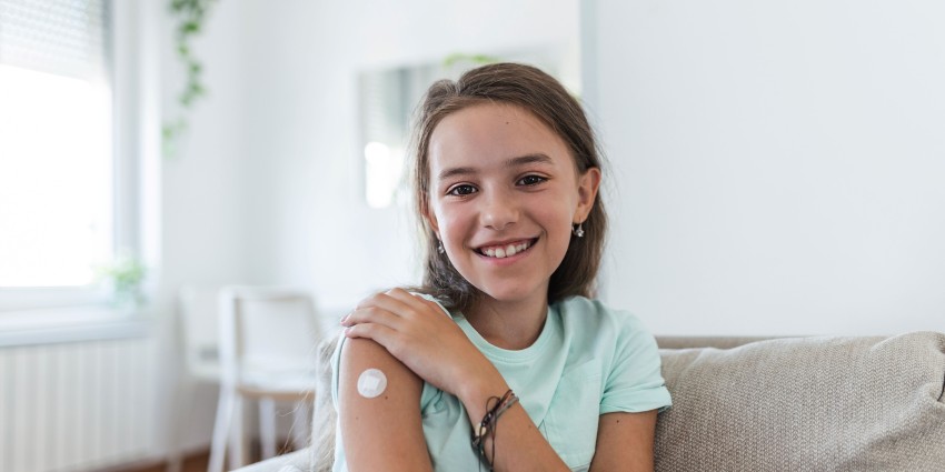 Free flu vaccinations for Western Australians throughout May and June 2024 announcement. Image: girl who has received vaccine.
