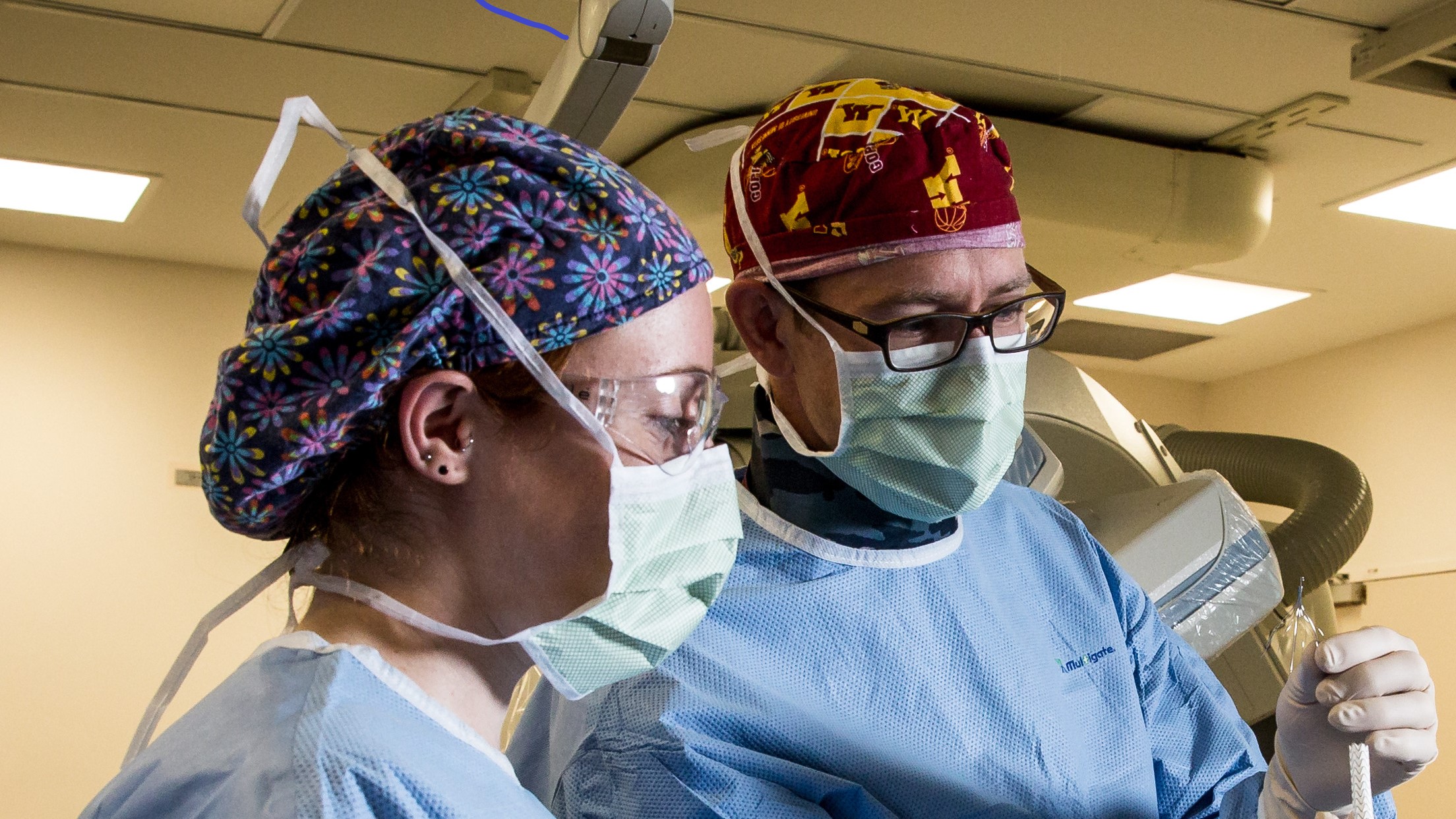 Two doctors in masks and PPE 