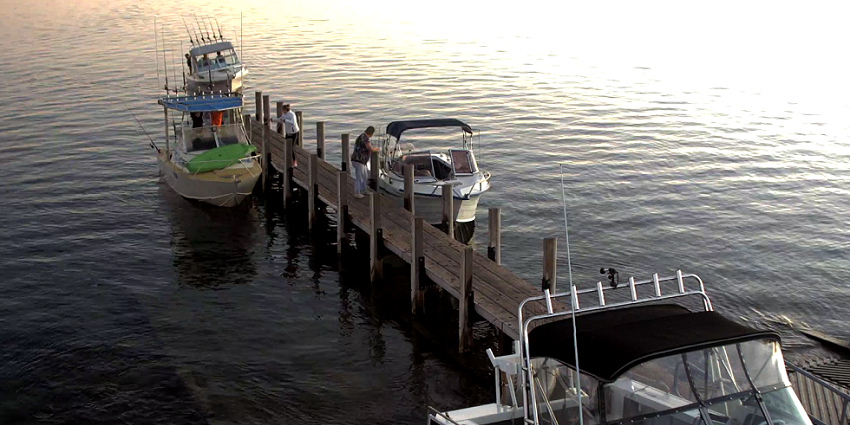 small fishing boats docked at jetty