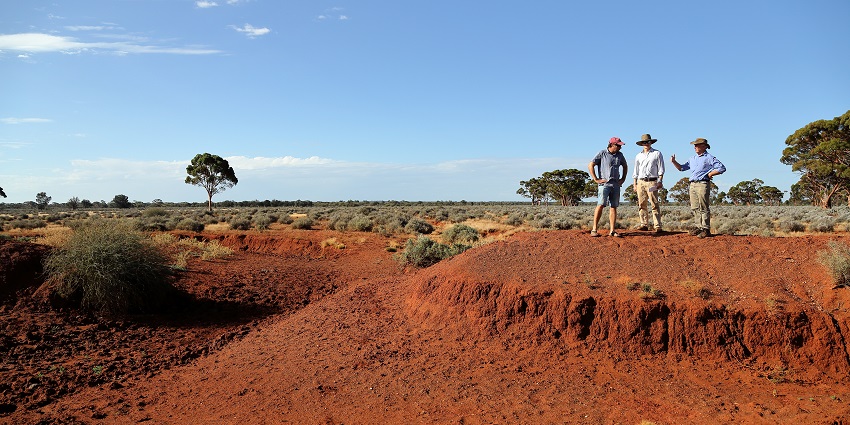 Men standing on elevated part of Goldfields station