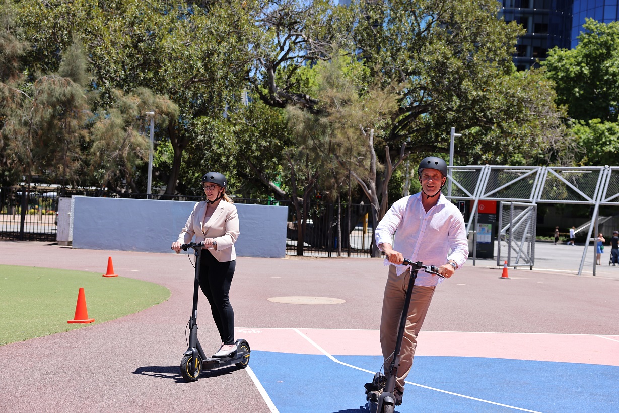 Minister for Road Safety and Minister for Transport riding eScooters