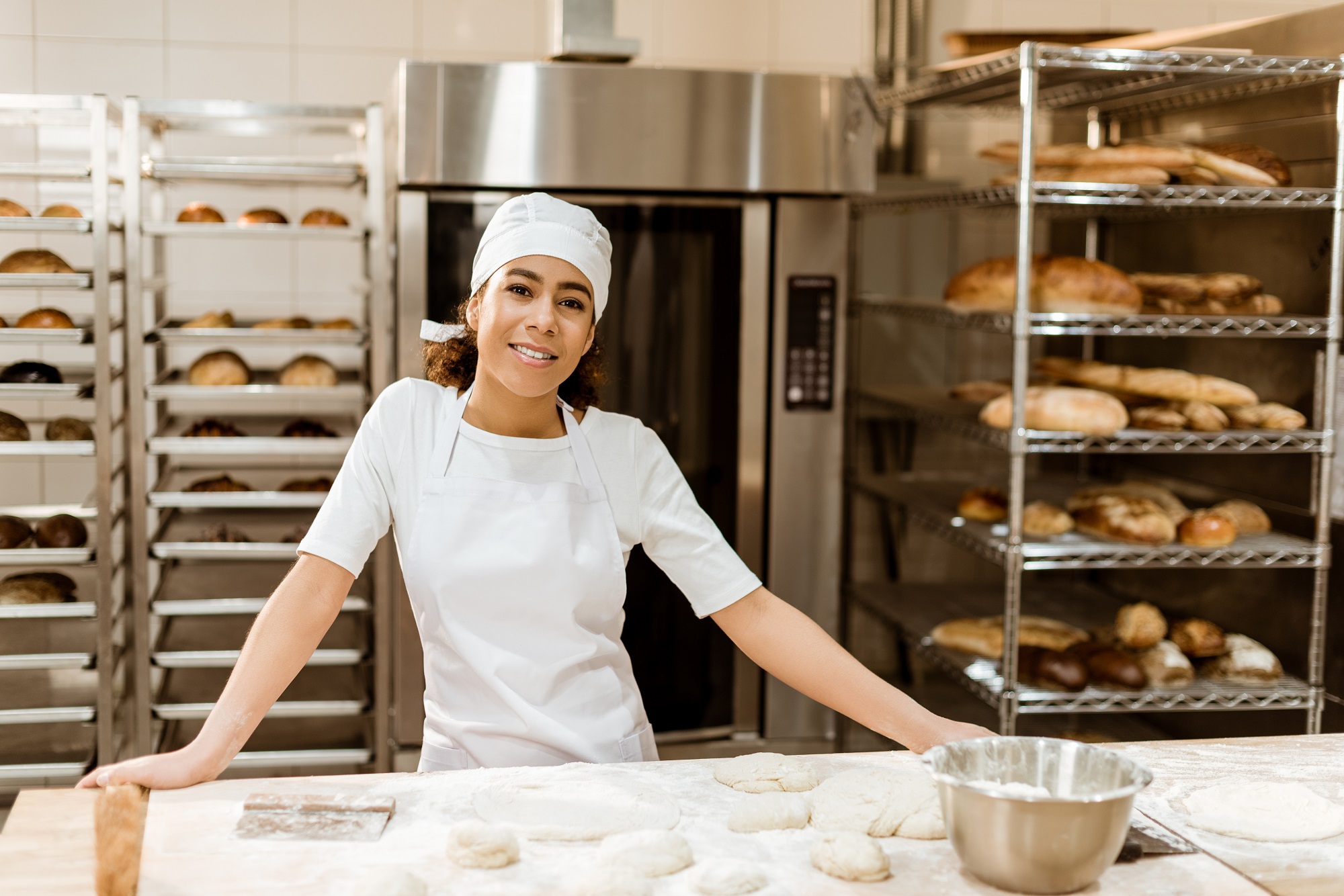 Female baker standing in bakery 