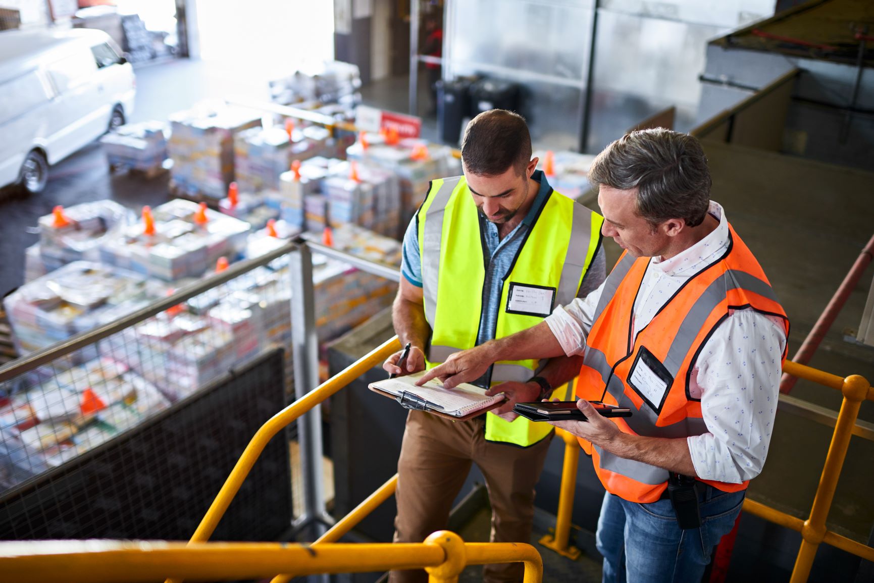 Two men performing stock inventory