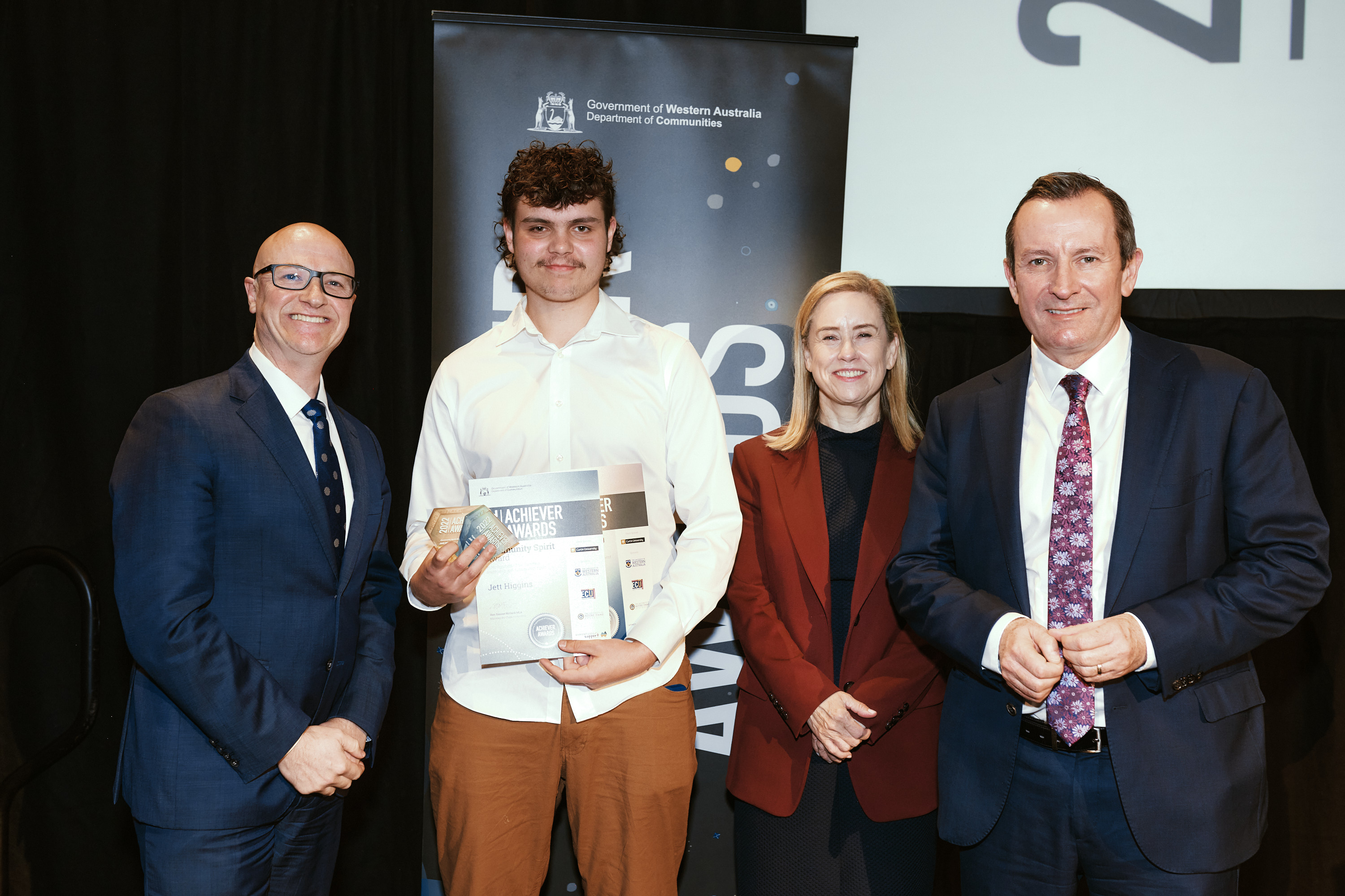 Community Spirit winner Jett Higgins with Mike Rowe, Minister McGurk and Premier McGowan.