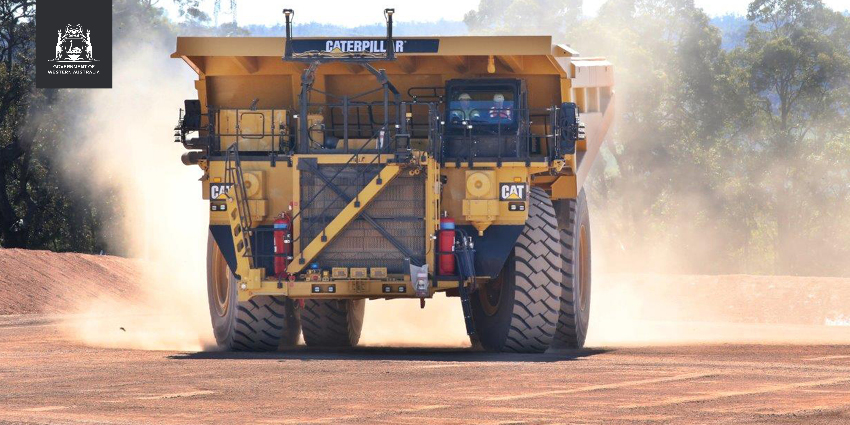 Collie Industry Transition Fund announcement image of a caterpillar truck in Collie