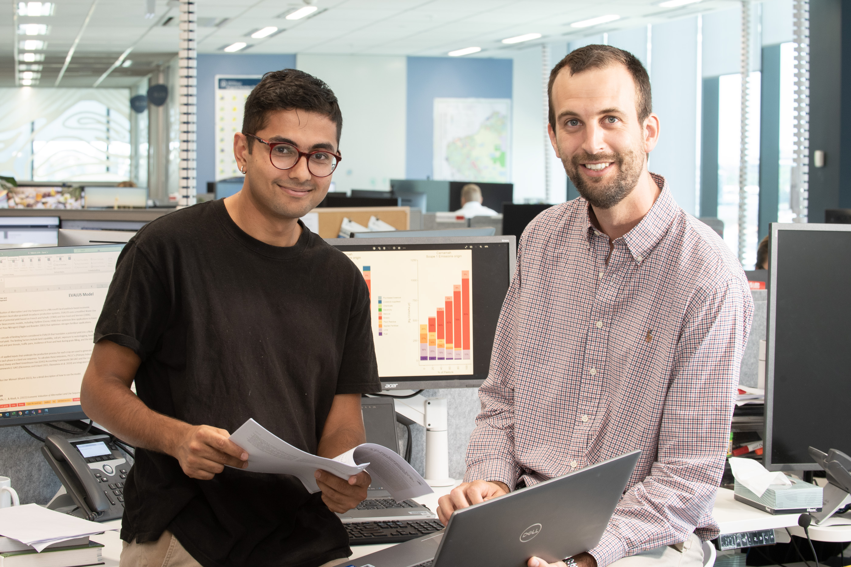 Research scientist Sud Kharel and business analyst Christophe D'Abbadie standing in DPIRD office.