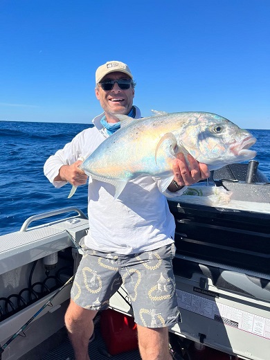 Recfisher with gold spot trevally