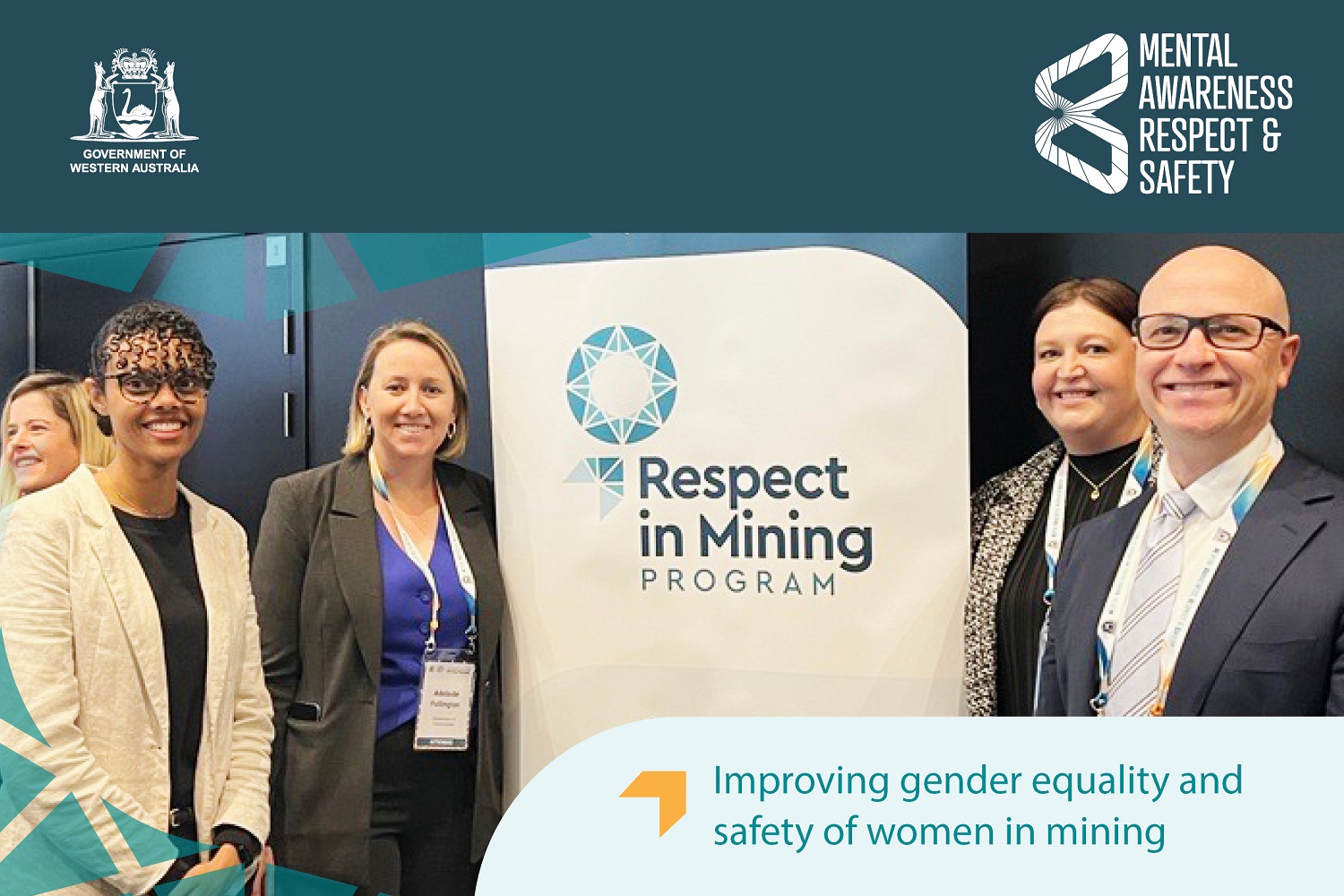 Photo of a group of people (including Communities Director General Mike Rowe) and the Respect in Mining Program banner