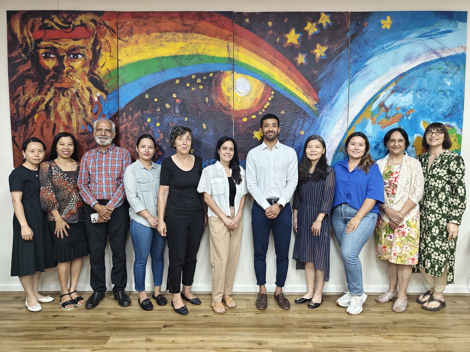 Group photo of a group of men and women of varying ages