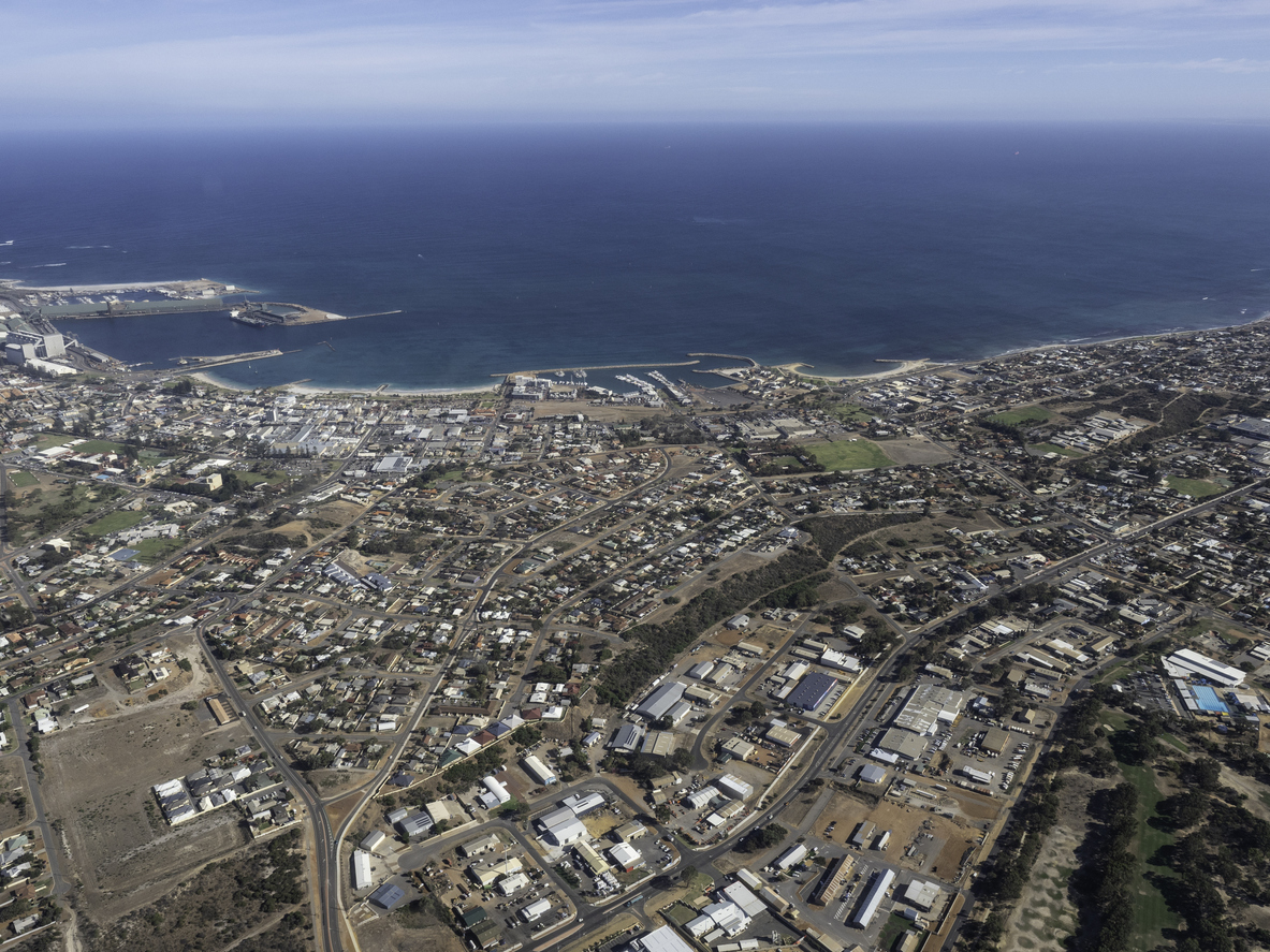 arial photo of the WA coastline and a WA town