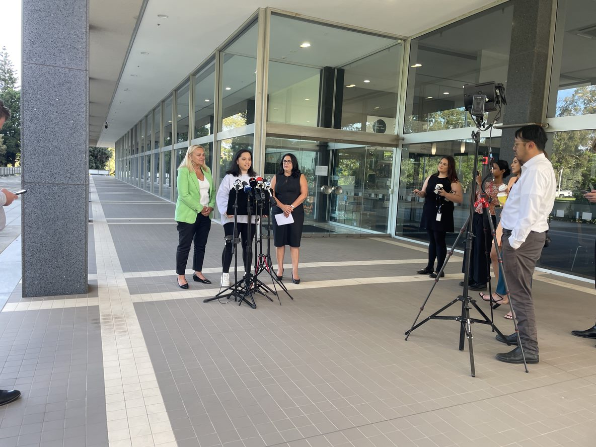 photo of a press conference featuring Minister Sabine Winton