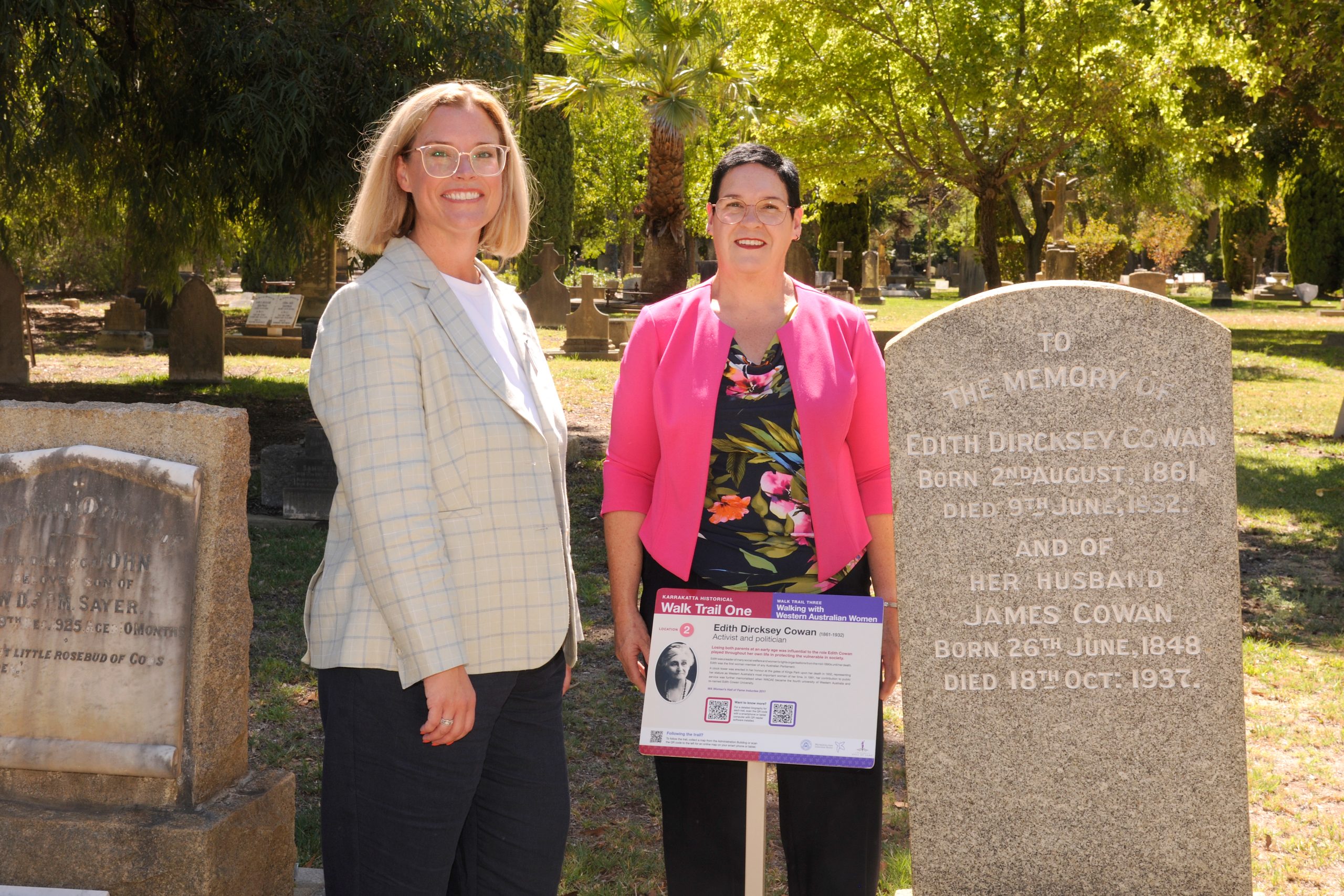 the Hon. Hannah Beazley with CEO Kathlene Oliver in front of Edith Cowan's headstone on the new Walking with Western Australian Women walk trail at Karrakatta Cemetery.