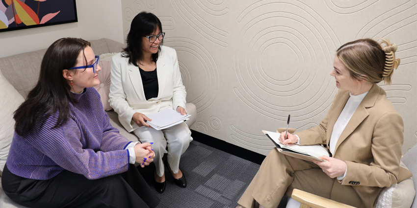 Ruah Legal Services - 3 women having a discussion