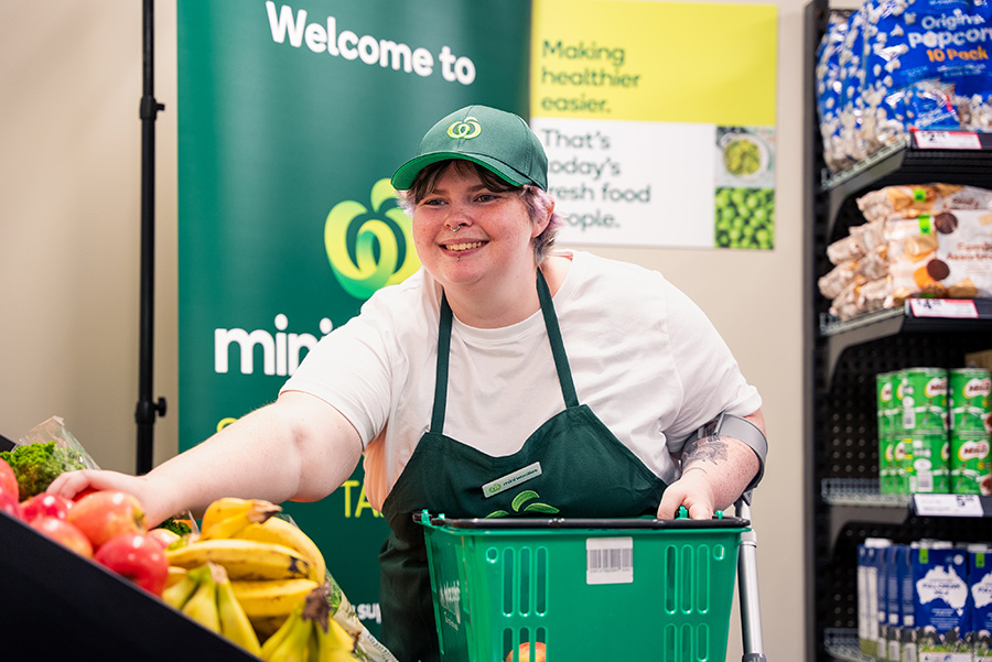 A young TAFE student training at the grocery training facility.