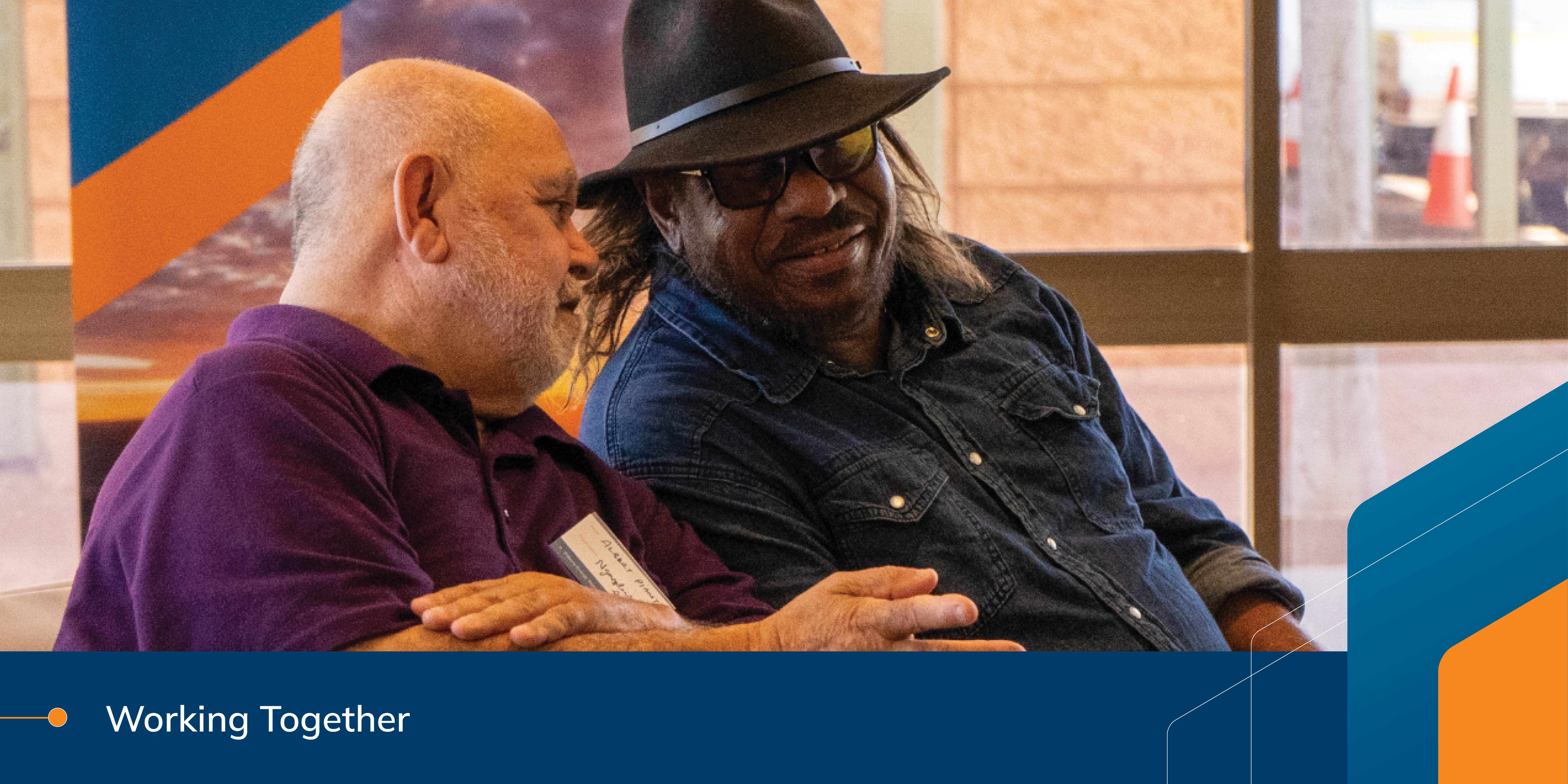 Two men talking at the most recent Pilbara Roundtable event