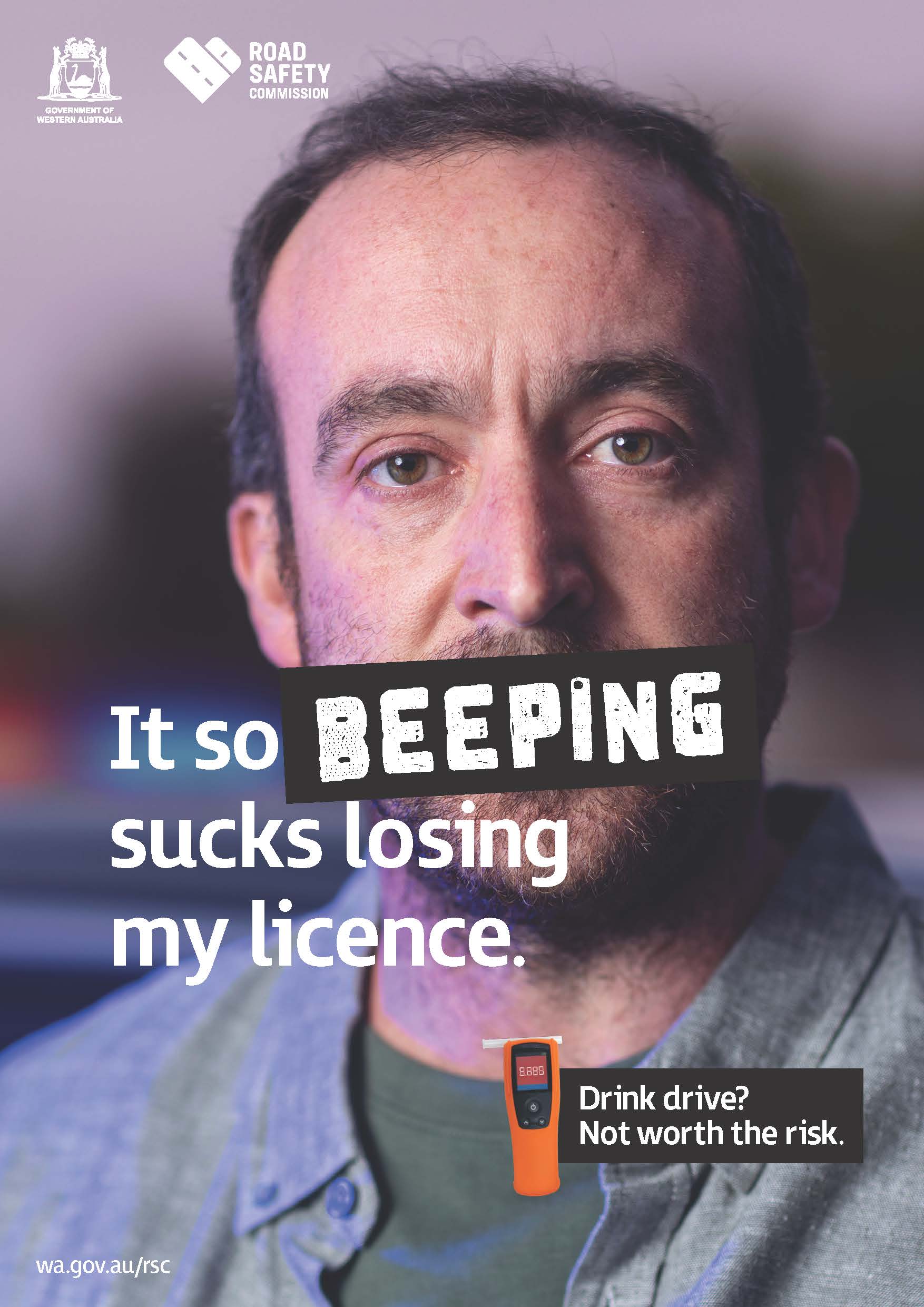 close up of a man's face with text 'it so beeping sucks losing my licence' over the top of his mouth