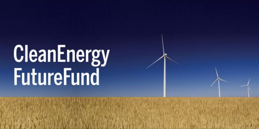 Clean energy future fund logo, field of crops and three wind turbines