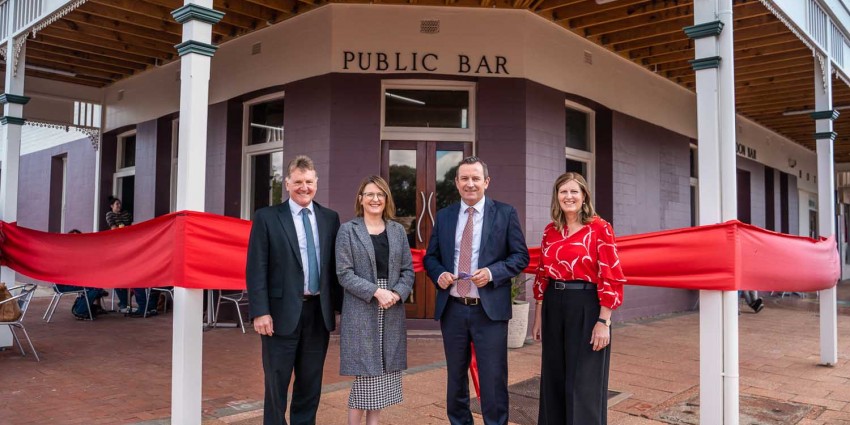 Premier Mark McGowan pictured in front of the Public Bar in Collie pictured ready to cut a red ribbon