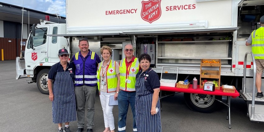 photo of Communities staff and the Emergency Services Salvation Army vehicle