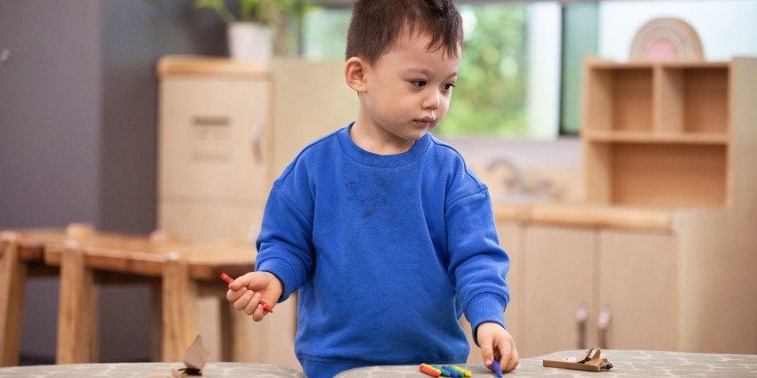 Photo of a young child in an early learning environment