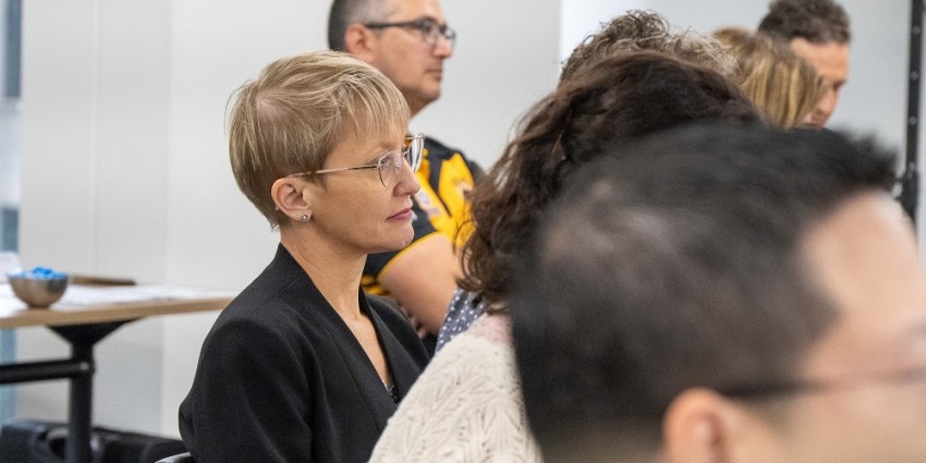 Participant in the Elev8 Insightful Leader session listening to the presenter