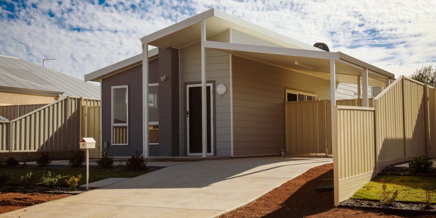 A picture of the façade of a newly built house