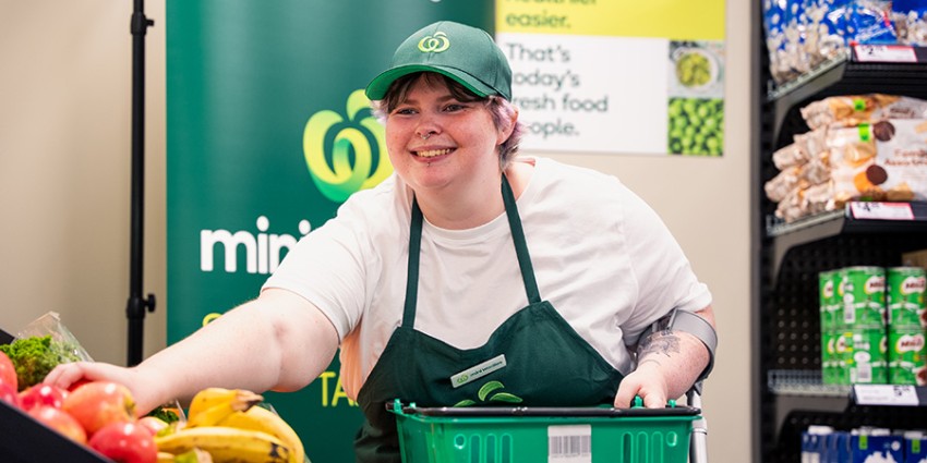 A young TAFE student training at the grocery training facility.