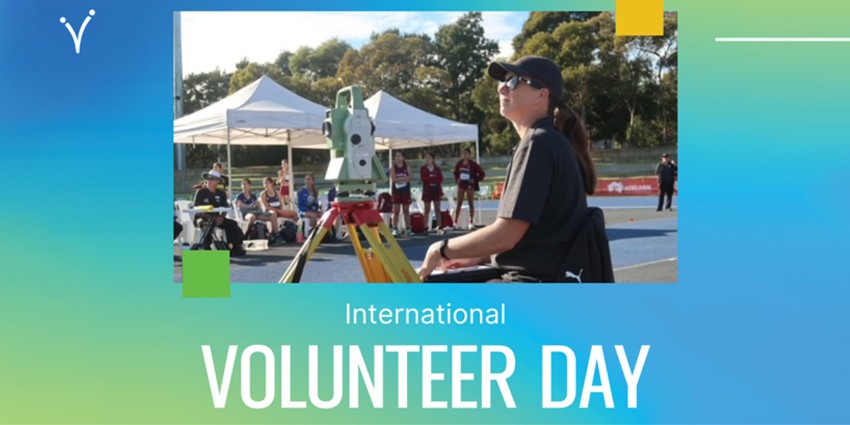 Image of a volunteer and the word International Volunteer Day